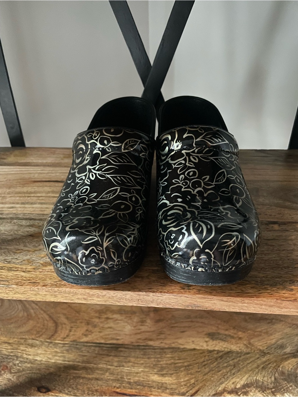 Dansko Black Floral Patent Slip-On Clogs